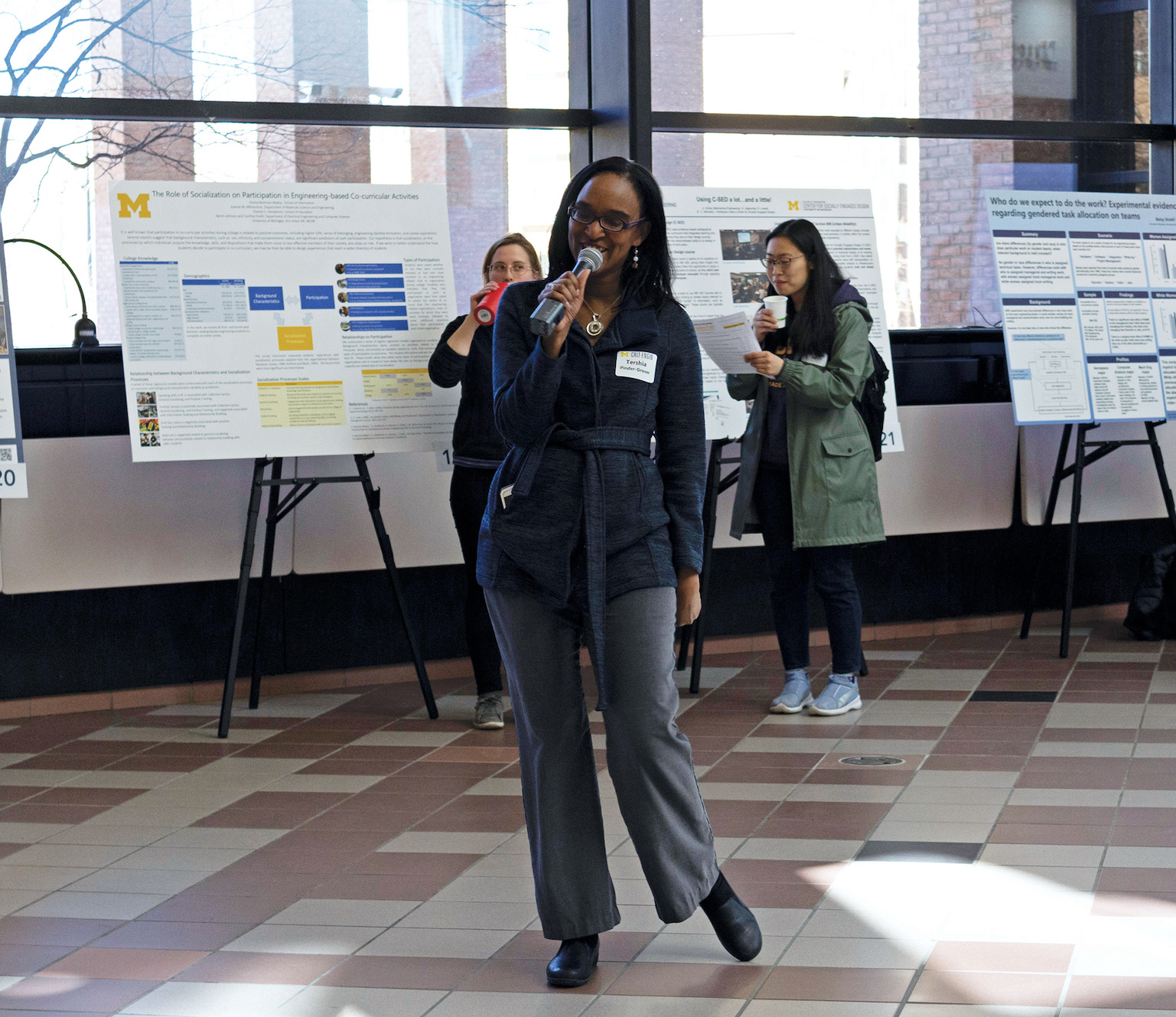 Tershia Pinder-Grover engaging faculty at a teaching innovation poster session she organized.